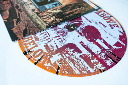 A vinyl LP by The Bar Stool Preachers is partially pulled from its bold red-orange abstract cover, labeled “ABOVE” and “BELOW,” and features an exclusive Orange & Oxblood splatter. Secure your copy now during the presale!.