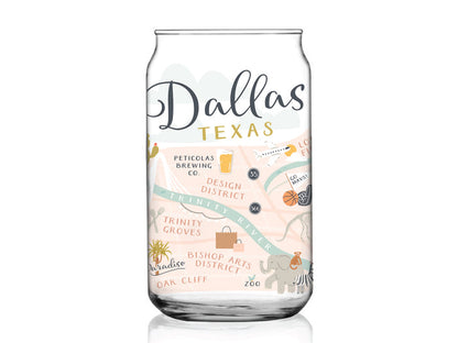 The Dallas Map Can Glass by Onderkast Studio features a vibrant city map illustration with colorful text and images of landmarks like Trinity Groves, Bishop Arts District, the zoo, and the Design District on clear glass.